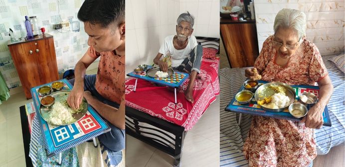 Caregiver serving healthy meals to seniors