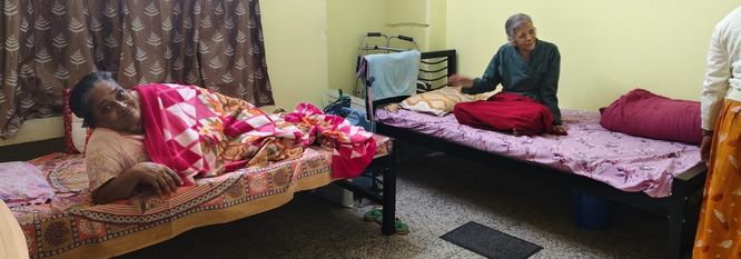 Comfortable bedroom at Ananda Niketan
